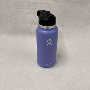 Hydroflask 32 water bottle in purple.